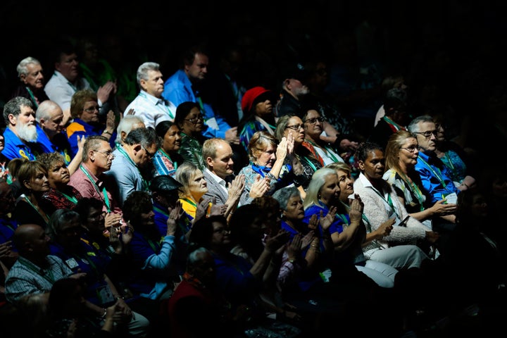 Members of the public watching a live telecast of the apology.