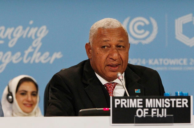 Prime Minister of Fiji, Frank Bainimarama, addresses representatives of almost 200 nations during a ceremonial opening of the key U.N. climate conference.