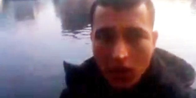 A still image taken from a video clip from a social media website purportedly shows Anis Amri, the Tunisian suspect of the Berlin Christmas market attack, at an unknown location.