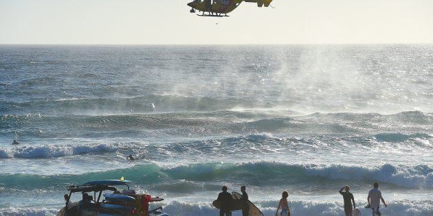 Surf lifesavers search for a boy who went missing at Maroubra Beach
