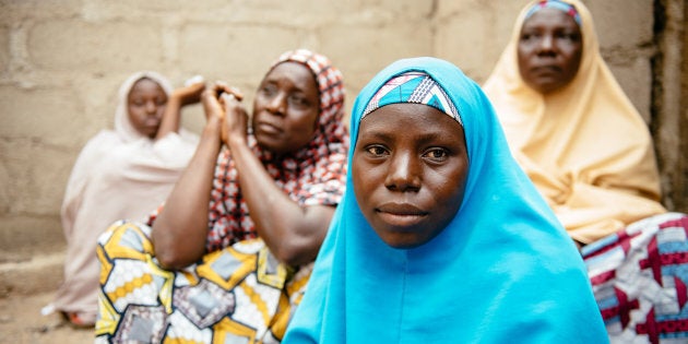 Aisha, 30, (blue hijab) in Biu, Borno State Nigeria. She and her four children were displaced 3 years ago after Boko Haram raided her village and killed her husband and two brothers.