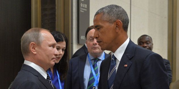 Russian President Vladimir Putin (L) meets with U.S. President Barack Obama on the sidelines of the G20 Summit in Hangzhou, China, September 5, 2016. Sputnik/Kremlin/Alexei Druzhinin/via REUTERS ATTENTION EDITORS - THIS IMAGE WAS PROVIDED BY A THIRD PARTY. EDITORIAL USE ONLY. TPX IMAGES OF THE DAY