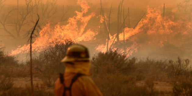 An uncontrolled bushfire is threatening homes in regional Victoria.