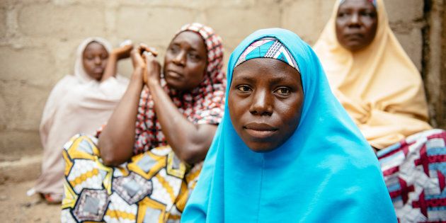 Aisha, 30, (blue hijab) in Biu, Borno State Nigeria. She and her four children were displaced 3 years ago after Boko Haram raided her village and killed her husband and two brothers.