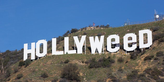 HOLLYWOOD, CA - JANUARY 01: The Iconic Hollywood Sign Gets Changed To Read 'Hollyweed' on January 1, 2017 in Hollywood, California. (Photo by Gabriel Olsen/Getty Images)