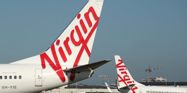 Virgin Australia check-in queues have left passengers waiting at Sydney Airport on Tuesday.