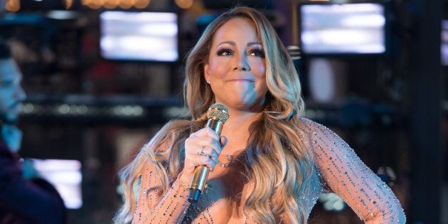 NEW YORK, NY - DECEMBER 31: Singer Mariah Carey performs during New Year's Eve 2017 in Times Square on December 31, 2016 in New York City. (Photo by Noam Galai/FilmMagic)
