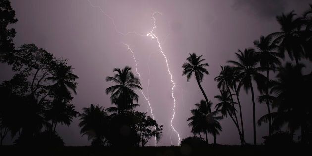 Lightning strikes over Lake Maracaibo in the village of Ologa, where the Catatumbo River feeds into the lake, in the western state of Zulia October 23, 2014. This year the Catatumbo Lightning was approved for inclusion in the 2015 edition of Guinness World Records, dethroning the Congolese town of Kifuka as the place with the world's most lightning bolts per square kilometer each year at 250. Scientists think the Catatumbo, named for a river that runs into the lake, is normal lightning that just happens to occur far more than anywhere else, due to local topography and wind patterns. Picture taken with long exposure October 23, 2014. REUTERS/Jorge Silva (VENEZUELA - Tags: SOCIETY ENVIRONMENT TPX IMAGES OF THE DAY)ATTENTION EDITORS: PICTURE 10 OF 20 FOR WIDER IMAGE PACKAGE 'VENEZUELA'S ETERNAL STORM' TO FIND ALL IMAGES SEARCH 'CATATUMBO LIGHTNING'
