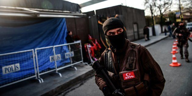 A Turkish special force police officer walks in front of the Reina nightclub on January 4, 2017 in Istanbul, three days after a gunman killed 39 people on New Year's night. The gunman had fought in Syria for Islamic State jihadists, a report said on January 3, as Turkish authorities intensified their hunt for the attacker. Of the 39 dead, 27 were foreigners, mainly from Arab countries, with coffins repatriated overnight to countries including Lebanon and Saudi Arabia. / AFP / OZAN KOSE (Photo credit should read OZAN KOSE/AFP/Getty Images)