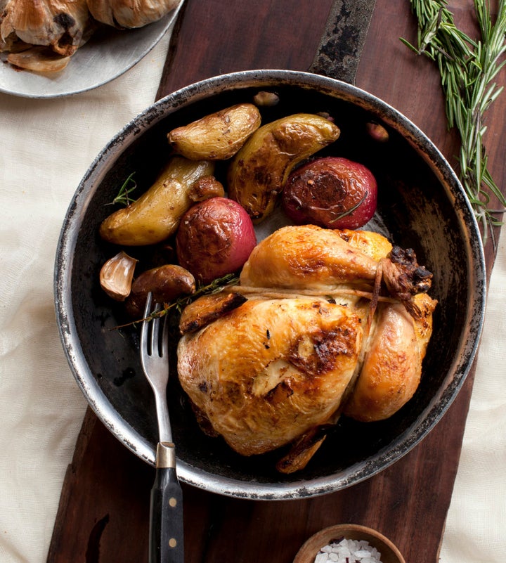 Use herbs like rosemary and thyme to flavour your chicken roast.