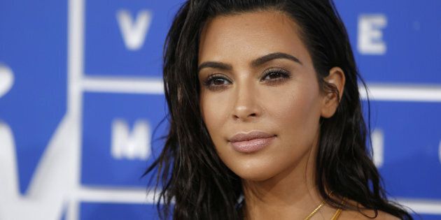 FILE PHOTO: Kim Kardashian arrives at the 2016 MTV Video Music Awards in New York, U.S., August 28, 2016. REUTERS/Eduardo Munoz/File photo