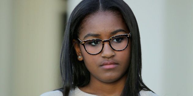 WASHINGTON, DC - NOVEMBER 25: Sasha Obama, daughter of U.S. President Barack Obama, participates in the turkey pardoning ceremony in the Rose Garden at the White House November 25, 2015 in Washington, DC. In a tradition dating back to 1947, the president pardons a turkey, sparing the tom -- and his alternate -- from becoming a Thanksgiving Day feast. This year, Americans were asked to choose which of two turkeys would be pardoned and to cast their votes on Twitter. (Photo by Chip Somodevilla/Getty Images)
