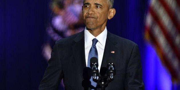 U.S. President Barack Obama reacts while speaking about U.S. First Lady Michelle Obama, not pictured, during his farewell address in Chicago, Illinois, U.S., on Tuesday, Jan. 10, 2017. Obama blasted 'zero-sum' politics as he drew a sharp contrast with his successor in his farewell address Tuesday night, acknowledging that despite his historic election eight years ago his vision for the country will exit the White House with him. Photographer: Christopher Dilts/Bloomberg via Getty Images