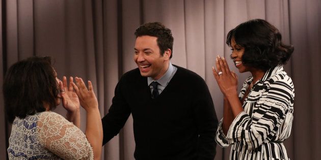 THE TONIGHT SHOW STARRING JIMMY FALLON -- Episode 0600 -- Pictured: (l-r) Host Jimmy Fallon and First Lady Michelle Obama surprise a guest during the 'Thank You First Lady Michelle Obama' segment on January 11, 2017 -- (Photo by: Andrew Lipovsky/NBC/NBCU Photo Bank via Getty Images)