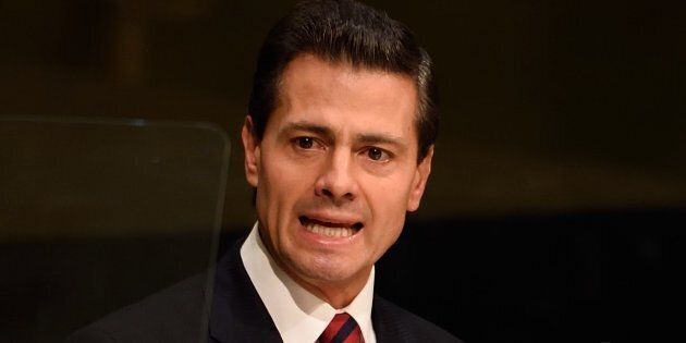Mexican President Enrique Pena Nieto speaks at a press conference following the capture of fugitive drug lord Joaquin