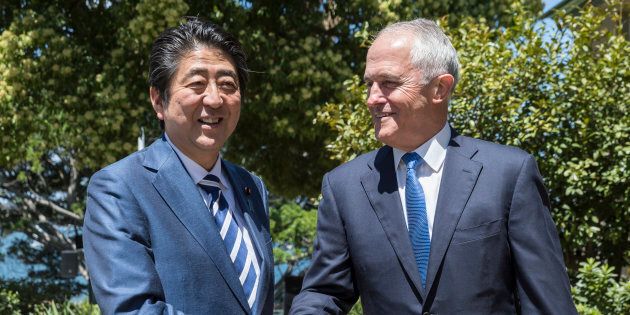 Japanese Prime Minister Shinzo Abe is greeted by the Australian Prime Minister Malcom Turnbull on arrival at Kirribilli House in Sydney, Australia.