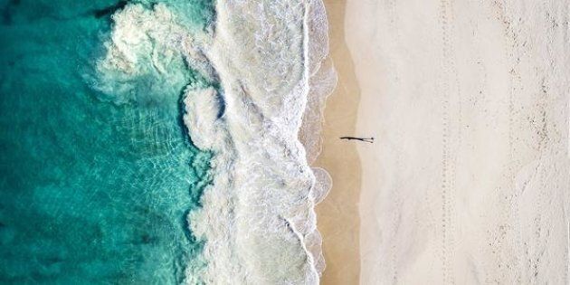 Just one person walking along Perth's Floreat Beach becomes a work of art with drone photography.