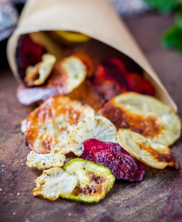 Season your homemade chips with dried herbs to lower the salt content.