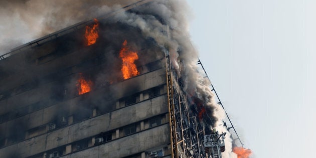 The Plasco building, one of the oldest in Tehran, caught fire on Thursday. Dozens of people were injured.