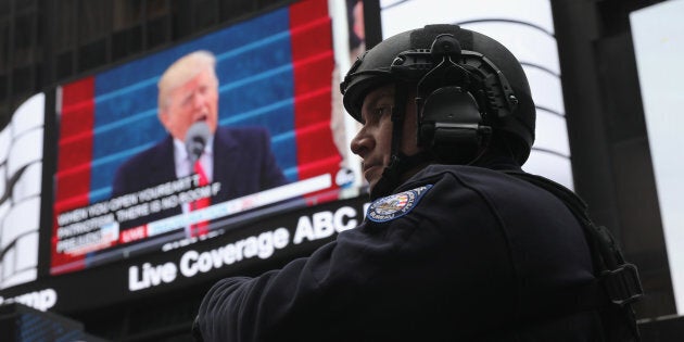 A policeman stands guard during the televised inauguration of Donald Trump as the 45th president of the United States, Jan. 20, 2017, in New York City.