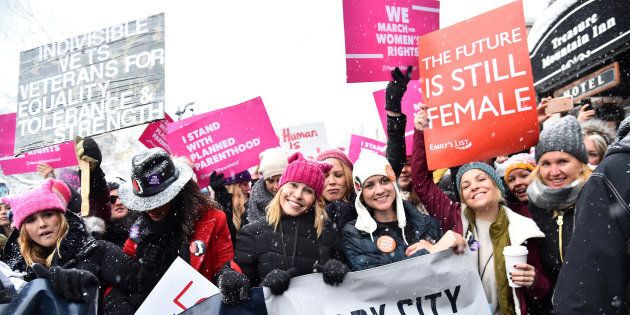 PARK CITY, UT - JANUARY 21: Jennifer Beals, Chelsea Handler, Mary McCormack and Charlize Theron participates in the Women's March on Main Street Park City on January 21, 2017 in Park City, Utah. (Photo by Michael Loccisano/Getty Images)