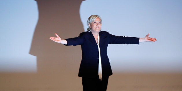 France's National Front leader Marine Le Pen gestures after her speech during a European far-right leaders meeting to discuss about the European Union, in Koblenz, Germany, January 21, 2017.