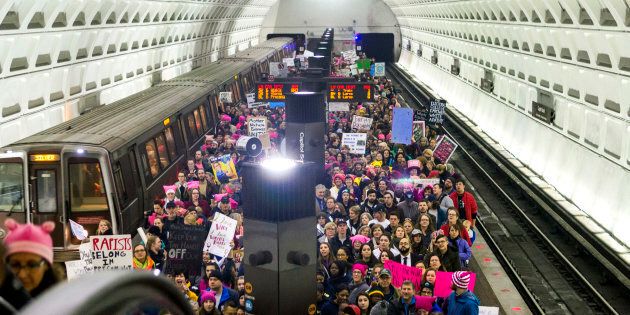 WASHINGTON, DC - JANUARY 21: Protesters arrive on the platform at the Capital South Metro station for the Women's March on Washington on January 21, 2017 in Washington, DC. Following the inauguration of Donald Trump as the 45th president of the United States, the Womens March has spread to be a global march calling on all concerned citizens to stand up for equality, diversity and inclusion and for womens rights to be recognised around the world as human rights. (Photo by Jessica Kourkounis/Getty Images)