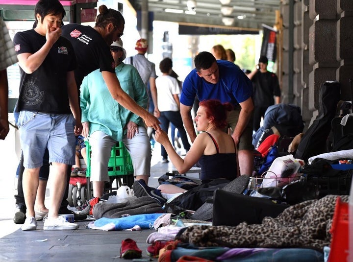 Homeless people camp along Flinders Street on January 18, 2017.