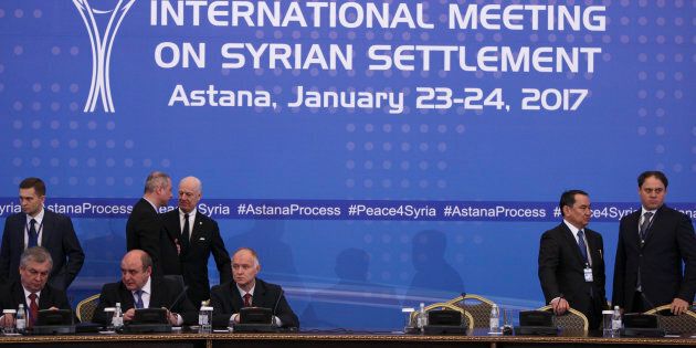 U.N. special envoy for Syria Staffan de Mistura waits with participants of Syria peace talks before a meeting in Astana, Kazakhstan January 23, 2017. REUTERS/Mukhtar Kholdorbekov