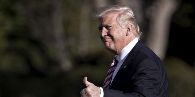 U.S. President Donald Trump gestures while walking towards the White House after arriving on the South Lawn of the White House in Washington, D.C., U.S., on Thursday, Jan. 27, 2017. Mexico's President Enrique Pena Nieto canceled a meeting with Trump planned for next week as a dispute over the president's border wall plan exploded into a showdown that threatens one of the worlds biggest bilateral trading relationships. Photographer: Andrew Harrer/Bloomberg via Getty Images