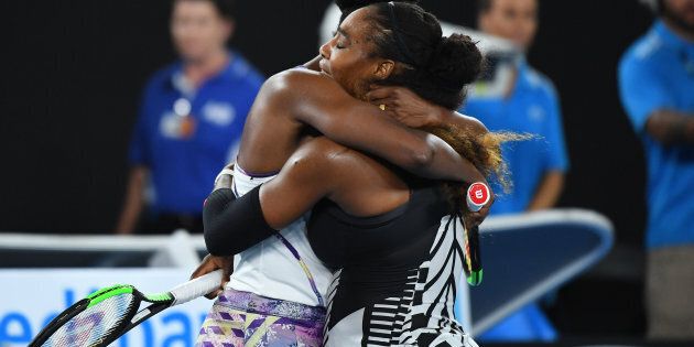 MELBOURNE, AUSTRALIA - JANUARY 28: Serena Williams of the United States is congratulated by Venus Williams of the United States after winning the Women's Singles Final match against on day 13 of the 2017 Australian Open at Melbourne Park on January 28, 2017 in Melbourne, Australia. (Photo by Quinn Rooney/Getty Images)