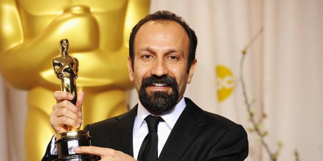 Asghar Farhadi poses with his Academy Award for best foreign language film for