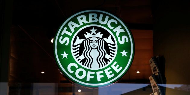 A Starbucks Coffee sign is pictured in Geneva, Switzerland, March 11, 2016. REUTERS/Denis Balibouse