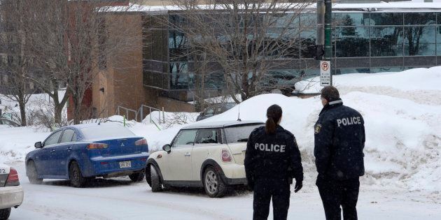 Police arrive at the scene of a fatal shooting at the Quebec Islamic Cultural Centre in Quebec City on Jan. 29. REUTERS/Mathieu Belanger