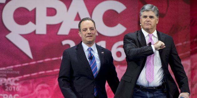 Reince Priebus (L), Chairman of the Republican National Committee (RNC), walks alongside Fox News Host Sean Hannity (R) during the annual Conservative Political Action Conference (CPAC) 2016 at National Harbor in Oxon Hill, Maryland, outside Washington, March 4, 2016. / AFP / SAUL LOEB (Photo credit should read SAUL LOEB/AFP/Getty Images)