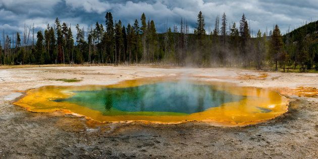 Nearly half of the world's natural World Heritage Sites, including Yellowstone National Park, are threatened by humanity, according to a new report.