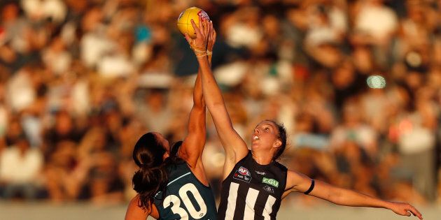 MELBOURNE, AUSTRALIA - FEBRUARY 3: Alison Downie of the Blues and Emma King of the Magpies compete in a ruck contest during the 2017 AFLW Round 01 match between the Carlton Blues and the Collingwood Magpies at Ikon Park on February 3, 2017 in Melbourne, Australia. (Photo by Michael Willson/AFL Media/Getty Images)