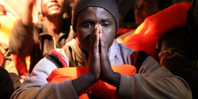 A migrant reacts aboard the former fishing trawler Golfo Azzurro of the Spanish NGO Proactiva Open Arms after a rescue operation of 104 sub-Saharan migrants aboard an overcrowded raft, in the central Mediterranean Sea, 24 miles north of the Libyan coastal city of Sabratha, January 27, 2017. REUTERS/Giorgos Moutafis