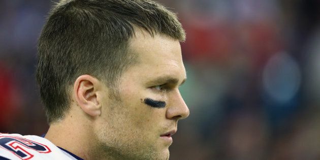 HOUSTON, TX - FEBRUARY 05: Tom Brady #12 of the New England Patriots looks on against the Atlanta Falcons prior to Super Bowl 51 at NRG Stadium on February 5, 2017 in Houston, Texas. (Photo by Al Bello/Getty Images)