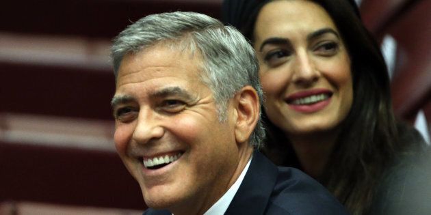 VATICAN CITY, VATICAN - MAY 29: George Clooney and Amal Clooney attend 'Un Muro o Un Ponte' Seminary held by Pope Francis at the Paul VI Hall on May 29, 2016 in Vatican City, Vatican. (Photo by Franco Origlia/Getty Images)