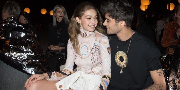 PARIS, FRANCE - OCTOBER 02: Gigi Hadid and Zayn Malik attend the Givenchy show as part of the Paris Fashion Week Womenswear Spring/Summer 2017on October 2, 2016 in Paris, France. (Photo by Stephane Cardinale - Corbis/Corbis via Getty Images)