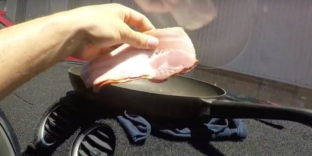 Guy cooks bacon in car during heatwave because he can.