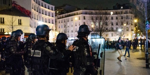 PARIS, FRANCE - FEBRUARY 08: Hundreds of demonstrators gather to support Theo in Menilmontant district on February 8, 2017 in Paris, France. Theo, 22, was violently arrested by four policemen in the Rose des Vents district of Aulnay sous Bois in Seine Saint Denis on Thursday, February 2, before being admitted to the hospital, suffering serious injuries caused by a truncheon in the rectal area. The scene was filmed and widely distributed, before one of the policemen was charged for rape, the other three for voluntary violence. They were all suspended. (Photo by Aurelien Morissard/IP3/Getty Images)