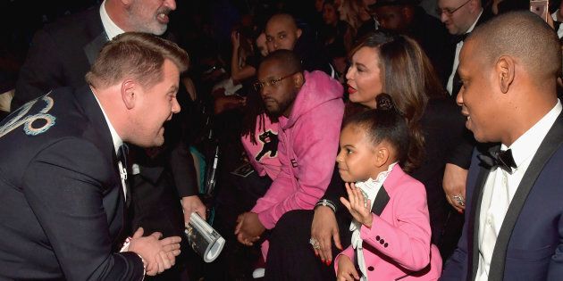 LOS ANGELES, CA - FEBRUARY 12: (L-R) Host James Corden, Blue Ivy Carter and rapper Jay Z during The 59th GRAMMY Awards at STAPLES Center on February 12, 2017 in Los Angeles, California. (Photo by Lester Cohen/Getty Images for NARAS)