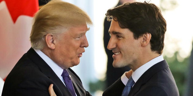 Canadian Prime Minister Justin Trudeau (R) is greeted by U.S. President Donald Trump prior to holdiing talks at the White House in Washington, U.S., February 13, 2017. REUTERS/Carlos Barria