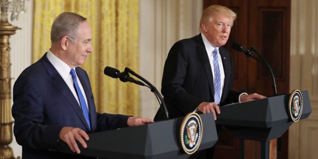 U.S. President Donald Trump (R) and Israeli Prime Minister Benjamin Netanyahu hold a joint news conference at the White House in Washington, U.S., February 15, 2017. REUTERS/Carlos Barria