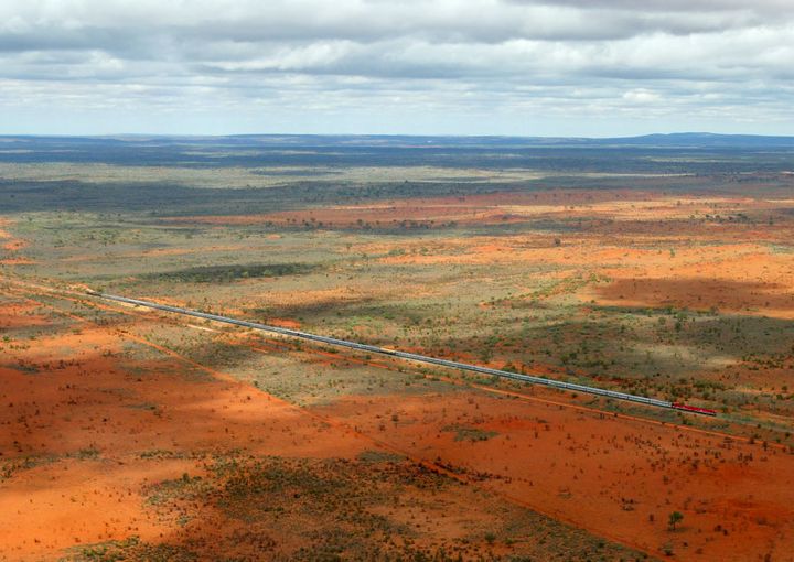 At over one kilometre in length, the outback Australian train known as the Ghan, heads north about 120 kilometres (85 miles) south of the town of Alice Springs in Australia's Northern Territory, February 2, 2004. The train which runs 2,979 kilometres (approx 1860 miles) to Darwin from Adelaide and is named for Afghan camel drivers who used their animals to carry goods over a similar route more than 150 years ago.