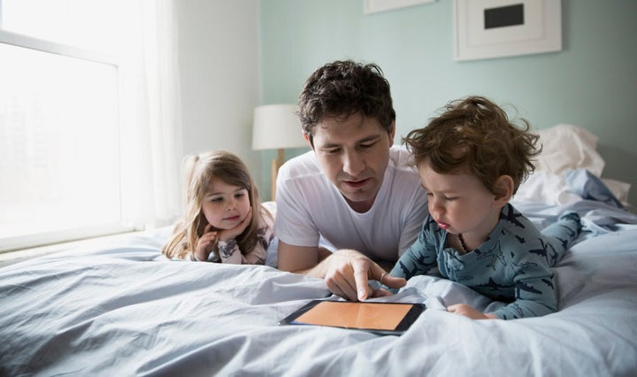 As tempting as it is, try to keep devices away from the bed.