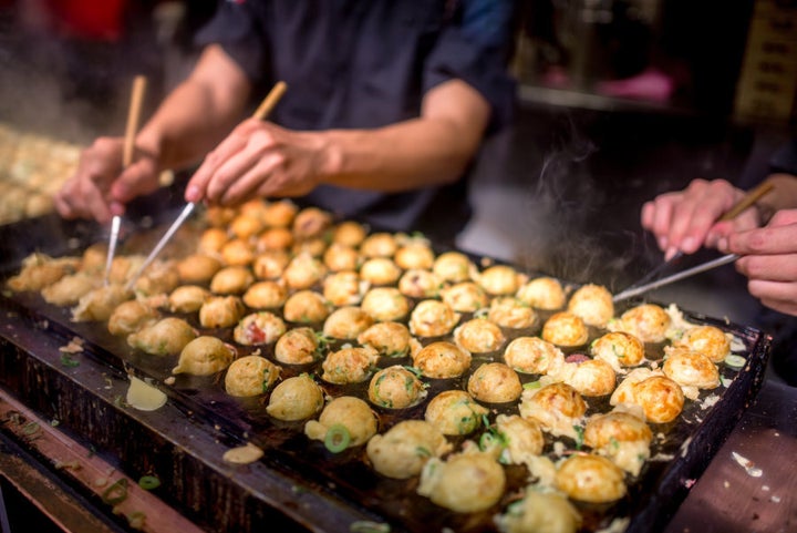 Takoyaki are made in round molds like this.