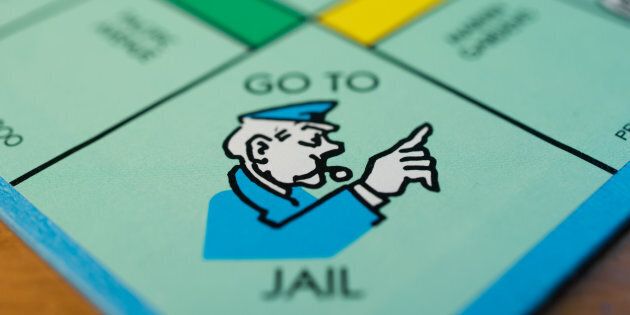 The 'Go To Jail' square is seen on a Hasbro Inc. Monopoly board game arranged for a photograph taken with a tilt-shift lens in Oradell, New Jersey, U.S., on Sunday, June 28, 2015. Photographer: Ron Antonelli/Bloomberg via Getty Images